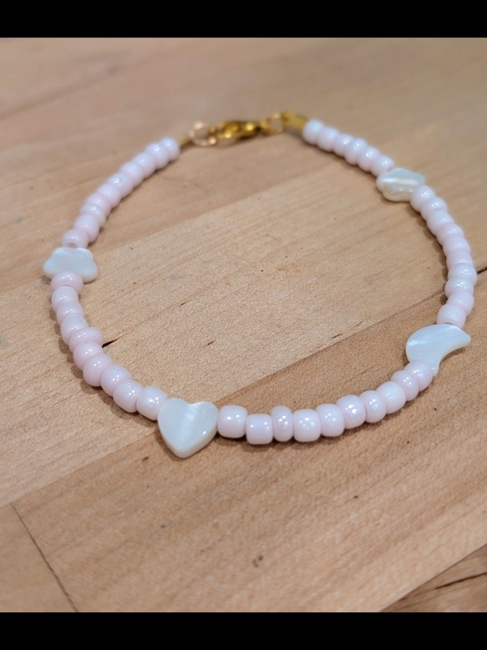 Delicate Pink Beaded Bracelet with Mother-of-Pearl Charms